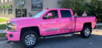pink truck wrapped