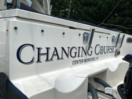 changinf course letter wrapped boat