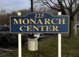 Monarch Center carved outdoor sign