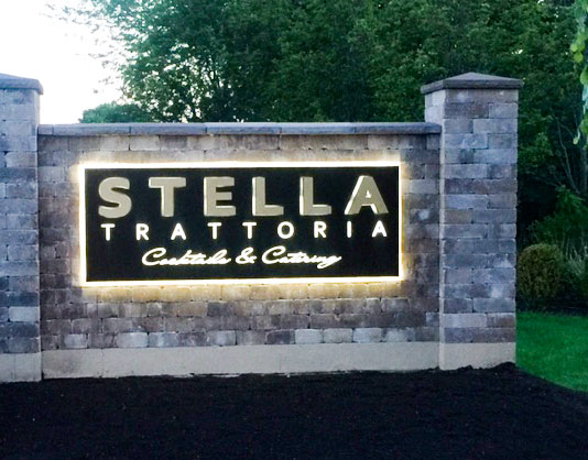 Stella Trattoria illuminated sign